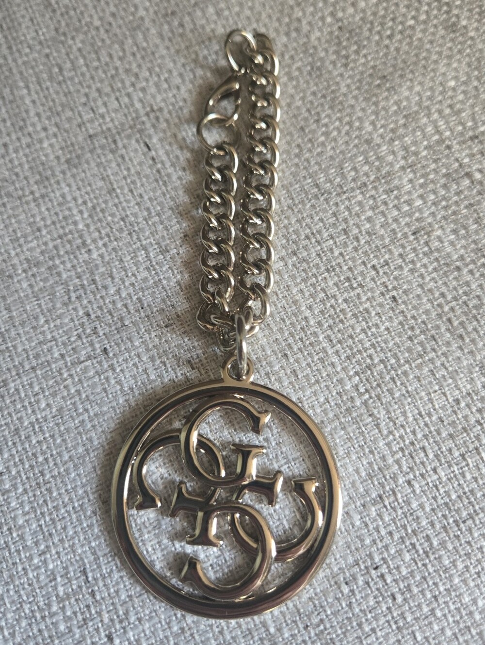 Gold Colored Guess Logo